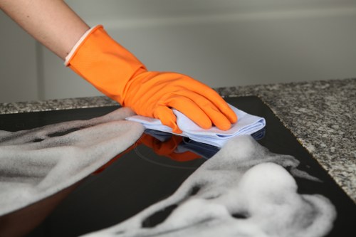 A cleaning team working in a Kennington apartment building with access considerations