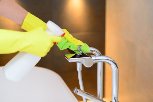 Freshening a used mattress with professional cleaning equipment in Kennington