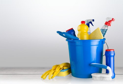 Post-construction cleaning in a Kennington apartment hallway with dusting and vacuuming